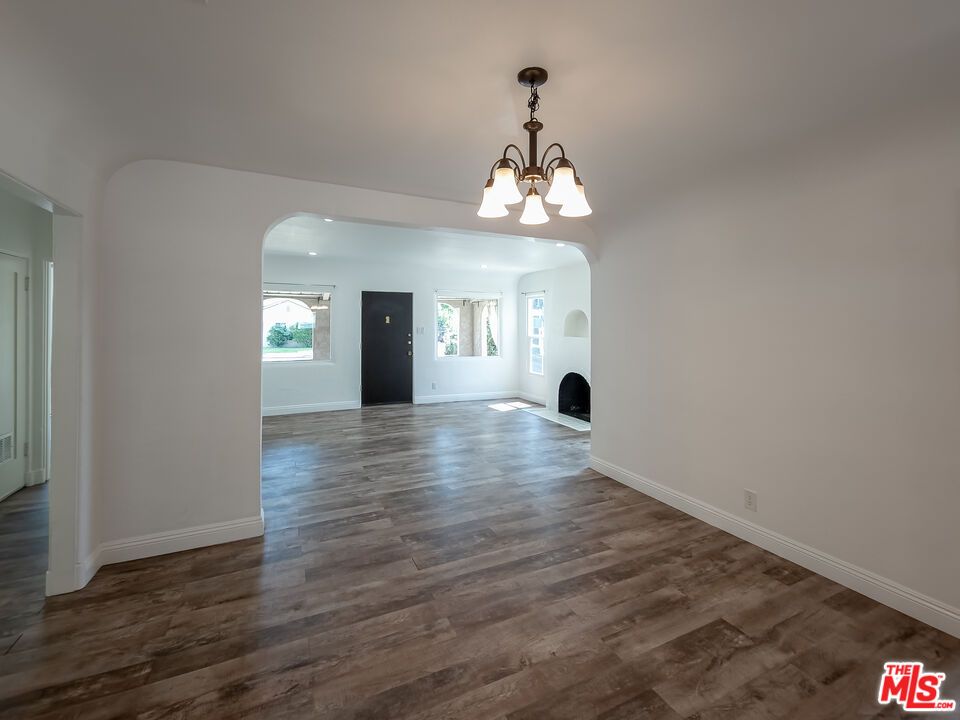 Chandelier, Empty room, Fireplace, Interior, Pendant Lights, Wood Texture Flooring