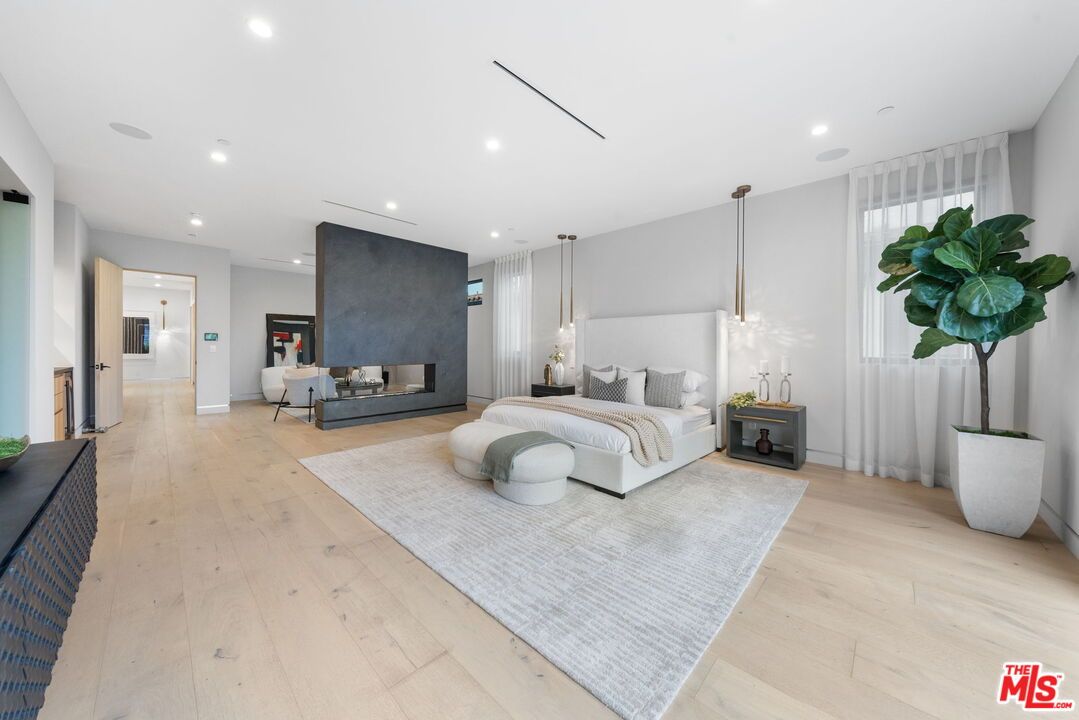 Bedroom, Fireplace, Interior, Pendant Lights, Recessed Lighting, Wood Texture Flooring