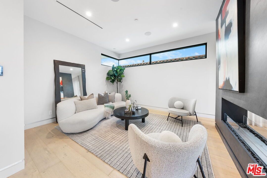 Fireplace, Interior, Living room, Recessed Lighting, Wood Texture Flooring