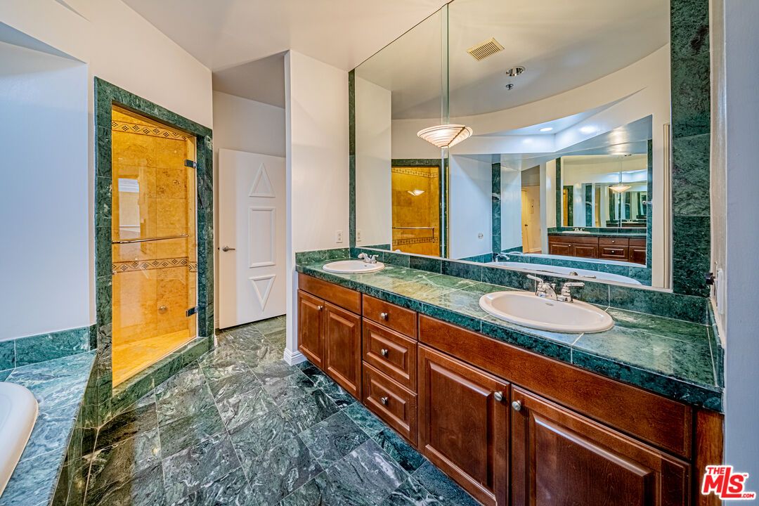 Bathroom, Dual Sink Vanities, Glass Shower, Interior, Marble, Pendant Lights, Recessed Lighting, Tile Countertops