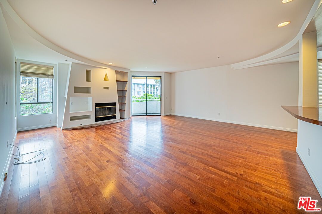 Empty room, Fireplace, Interior, Recessed Lighting, Wood Texture Flooring