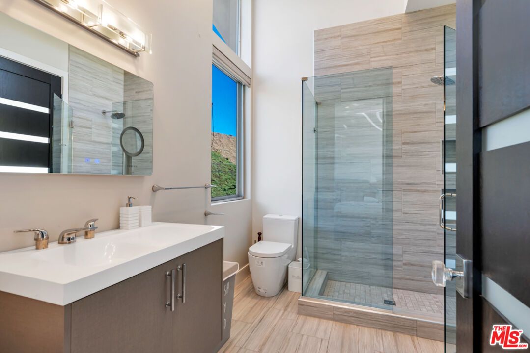 Bathroom, Dual Sink Vanities, Glass Shower, Interior, Wood Texture Flooring