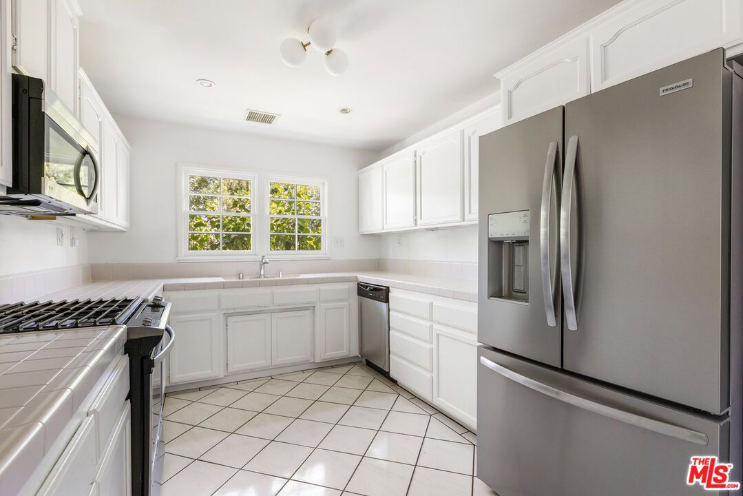 Interior, Kitchen, Recessed Lighting, Tile Countertops