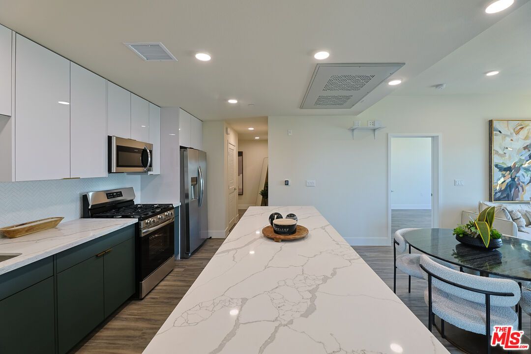 Interior, Kitchen, Recessed Lighting, Stainless Steel Appliances, Wood Texture Flooring