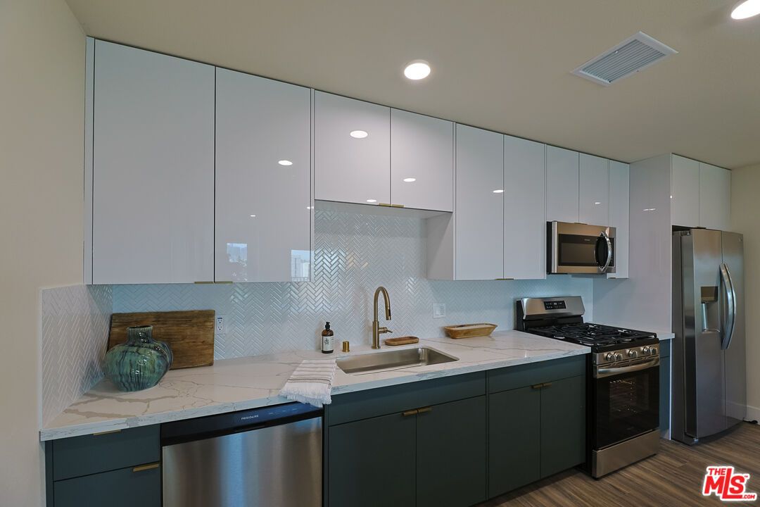 Interior, Kitchen, Recessed Lighting, Stainless Steel Appliances, Wood Texture Flooring