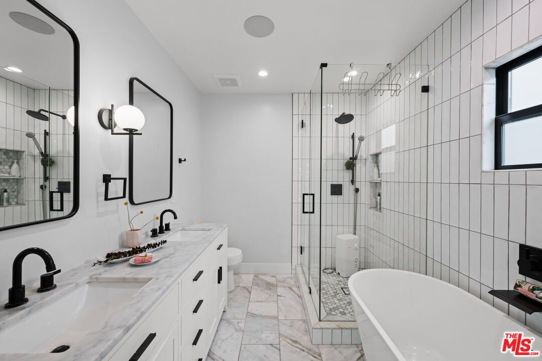 Bathroom, Dual Sink Vanities, Free Standing Baths, Glass Shower, Interior, Marble, Recessed Lighting