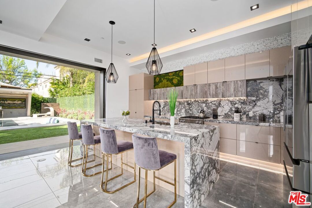 Interior, Kitchen, Marble Walls, Pendant Lights, Recessed Lighting, Stainless Steel Appliances