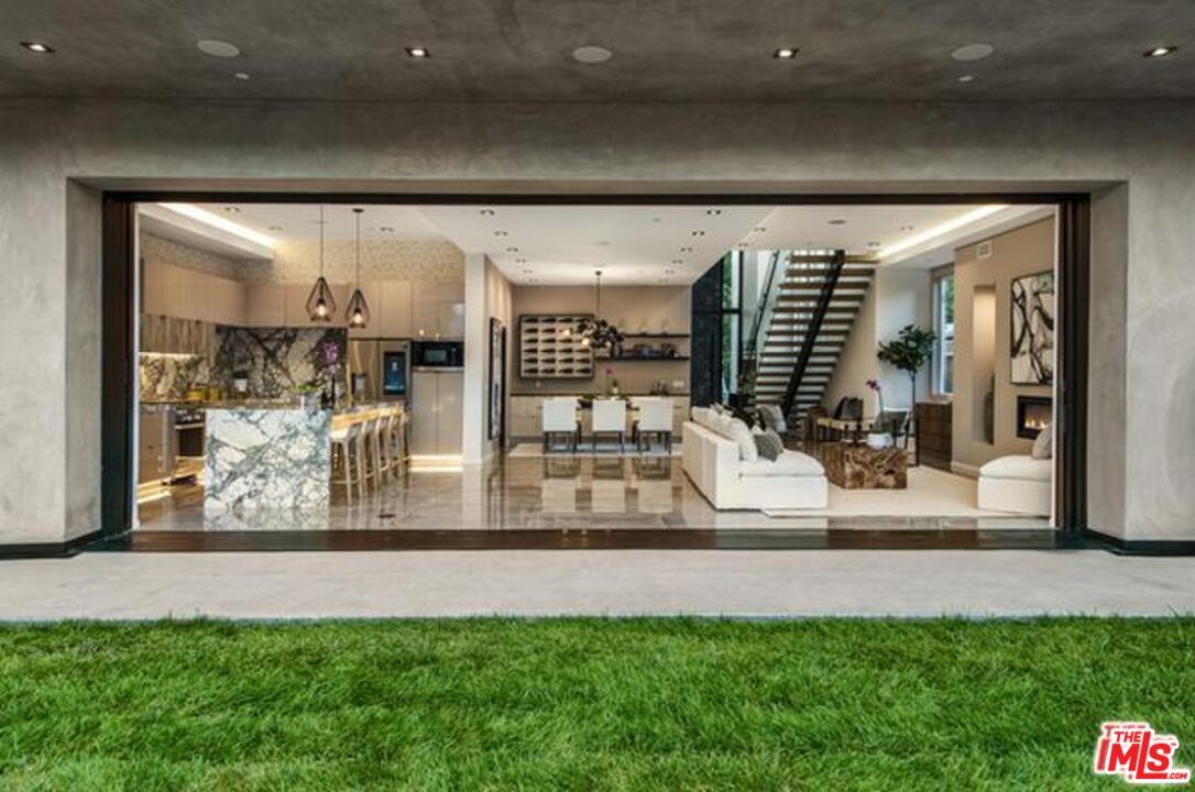 Interior, Kitchen, Living room, Marble Walls, Pendant Lights, Recessed Lighting, Stainless Steel Appliances, Wood Texture Flooring