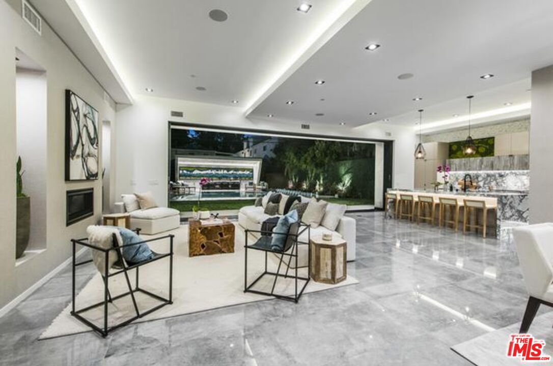 Fireplace, Interior, Living room, Marble, Marble Walls, Pendant Lights, Recessed Lighting