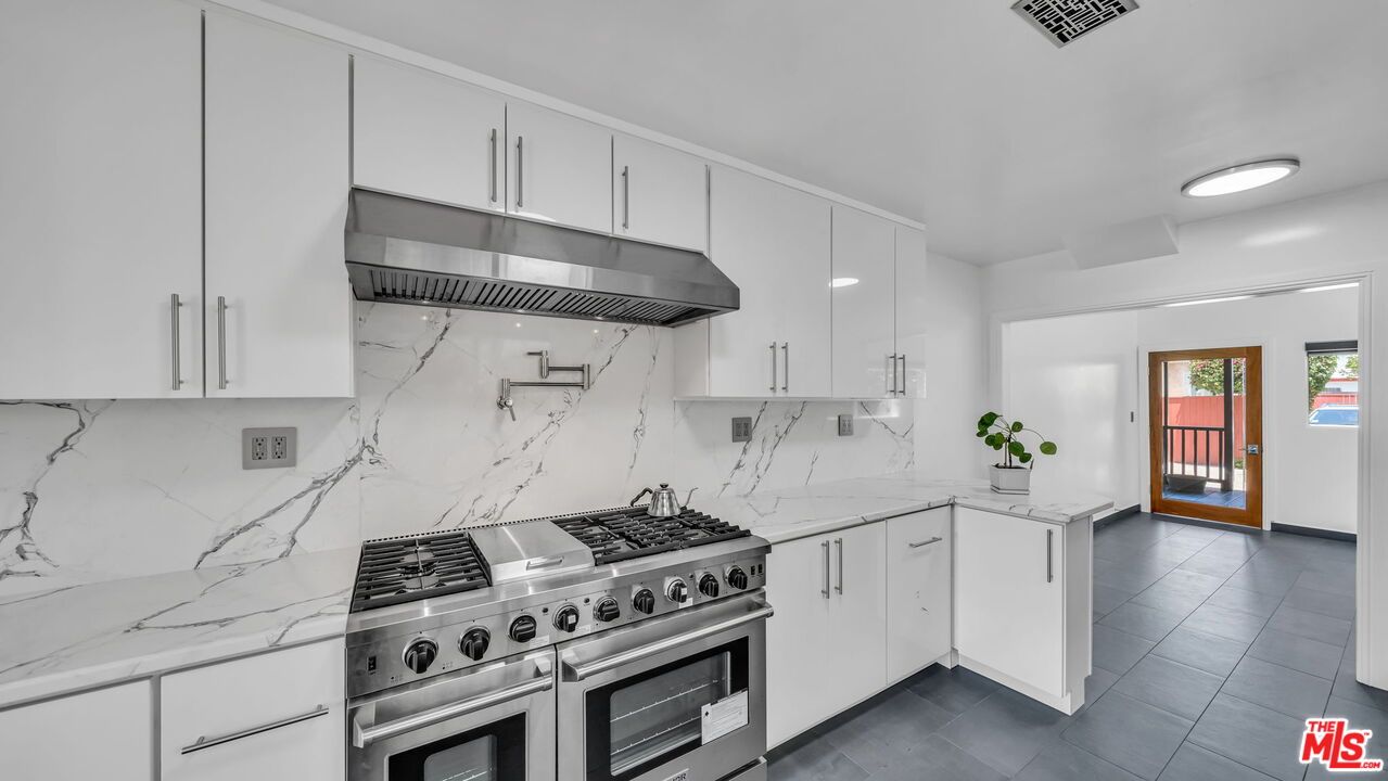 Interior, Kitchen, Marble Walls, Stainless Steel Appliances