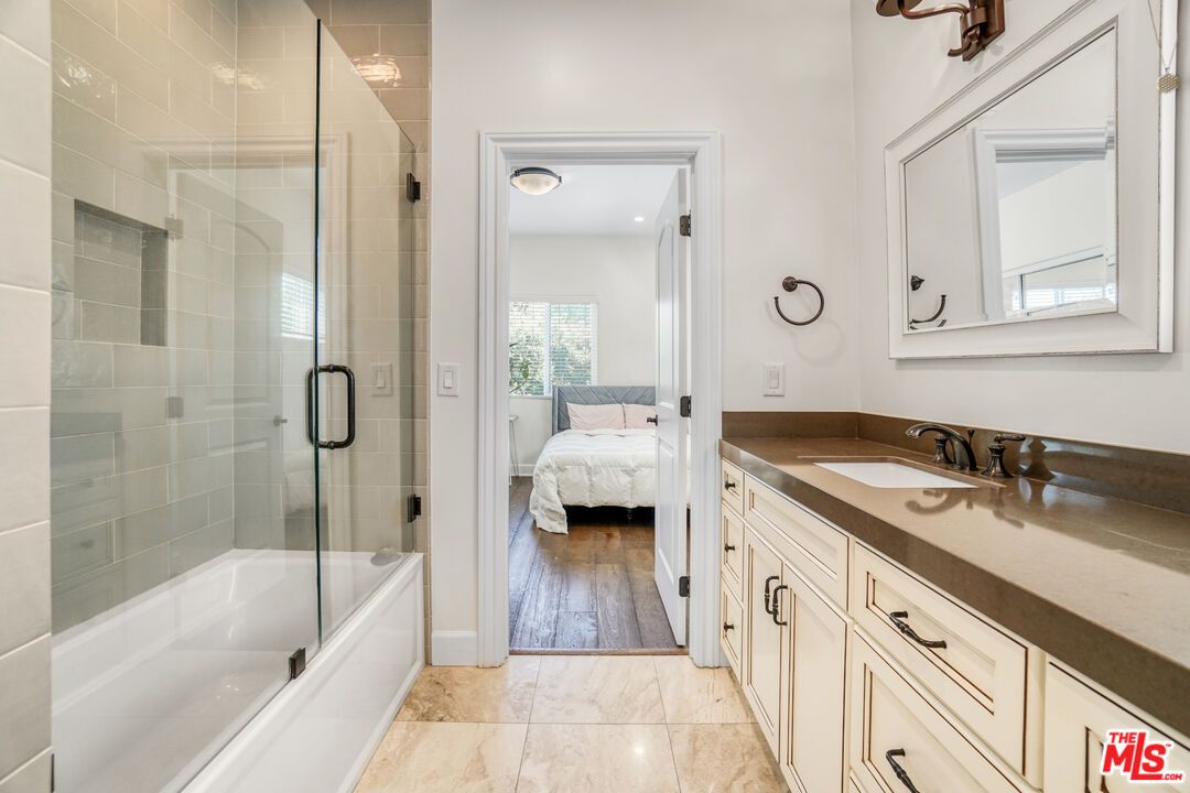 Bathroom, Bedroom, Dual Sink Vanities, Glass Shower, Interior, Wood Texture Flooring