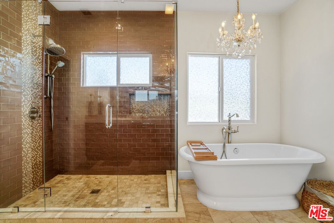 Bathroom, Chandelier, Free Standing Baths, Glass Shower, Interior, Stone Walls