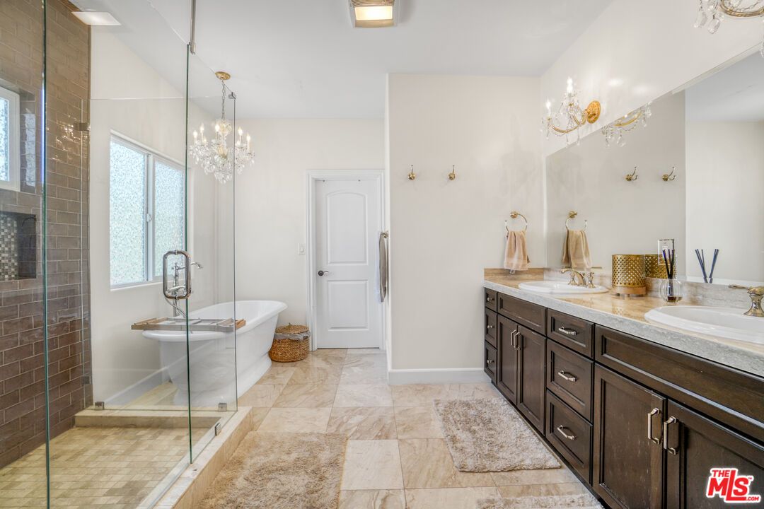 Bathroom, Chandelier, Dual Sink Vanities, Free Standing Baths, Glass Shower, Interior, Pendant Lights