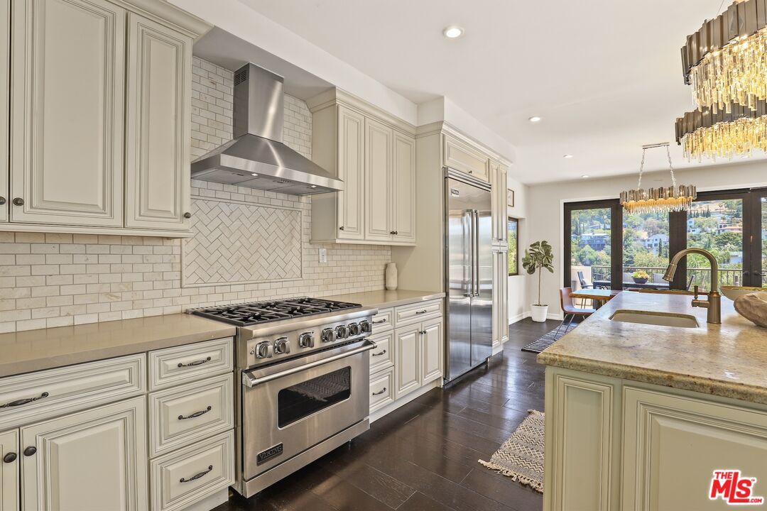 Chandelier, Interior, Kitchen, Pendant Lights, Recessed Lighting, Stainless Steel Appliances, Wood Texture Flooring