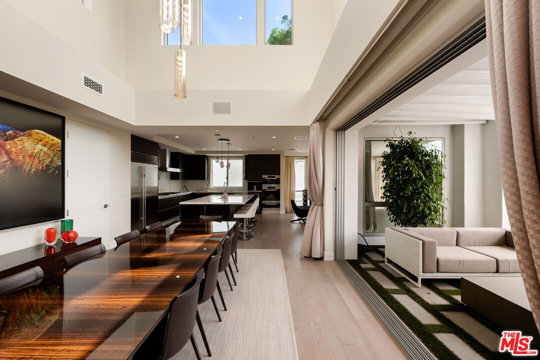 Dining room, Interior, Kitchen, Living room, Pendant Lights, Recessed Lighting, Stainless Steel Appliances, Wood Texture Flooring