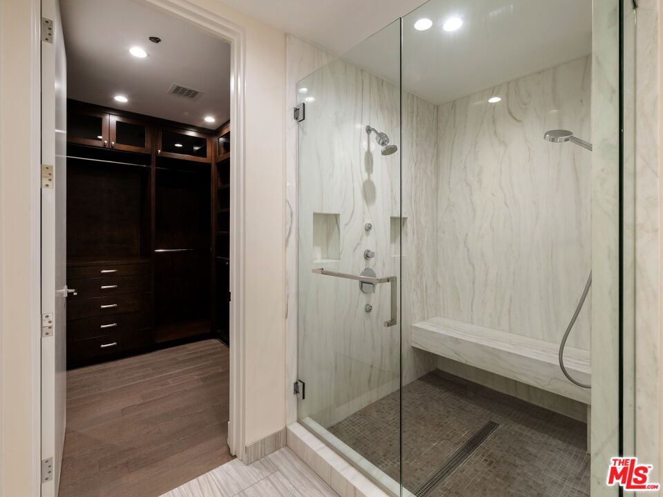 Bathroom, Glass Shower, Interior, Marble Walls, Recessed Lighting, Walk-in Closets, Wood Texture Flooring