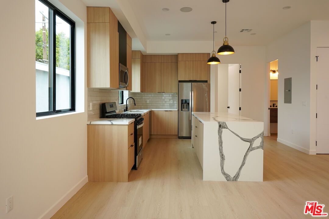 Interior, Kitchen, Pendant Lights, Recessed Lighting, Stainless Steel Appliances, Wood Texture Flooring