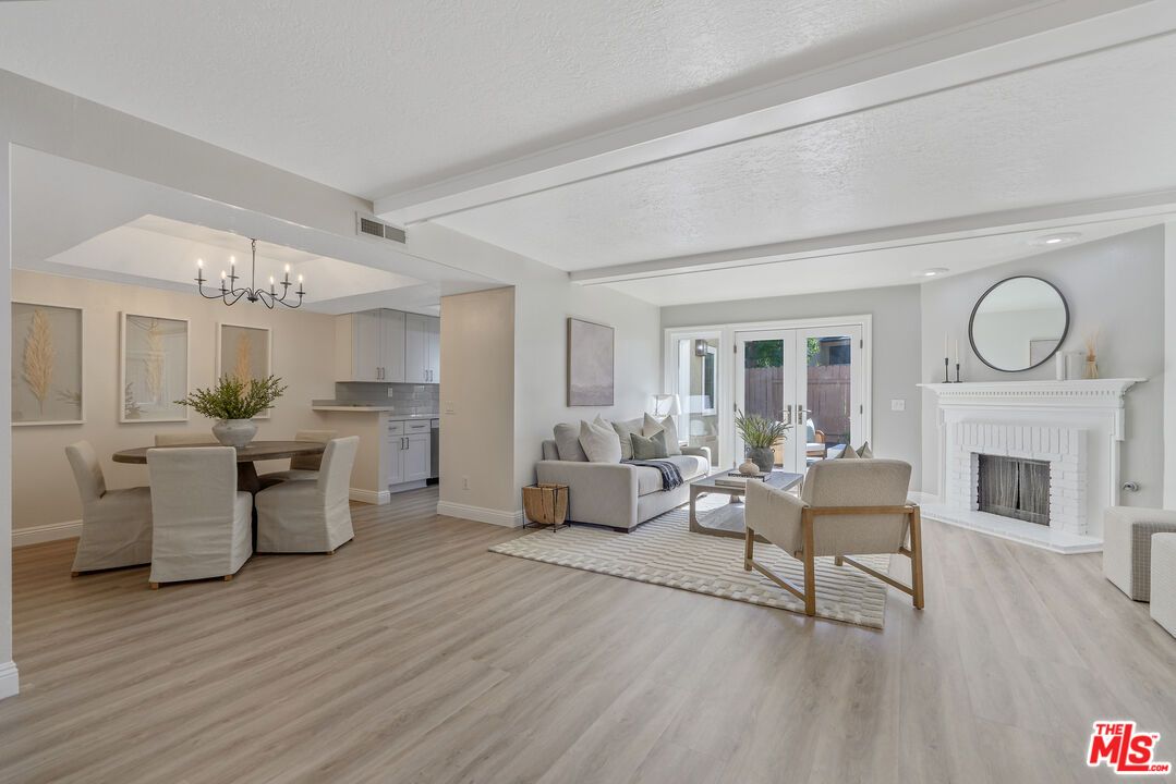 Chandelier, Dining room, Fireplace, Interior, Kitchen, Living room, Pendant Lights, Recessed Lighting, Wood Texture Flooring