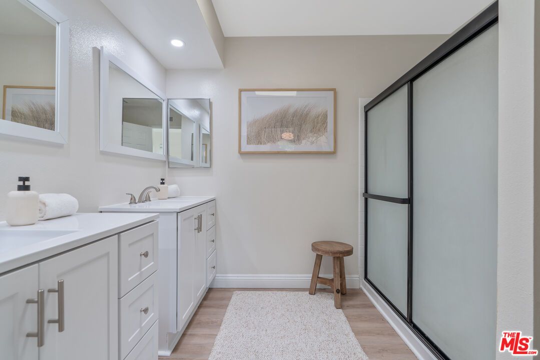 Bathroom, Dual Sink Vanities, Interior, Recessed Lighting, Wood Texture Flooring