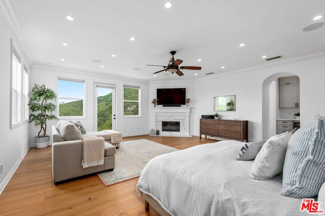 Bedroom, Fireplace, Interior, Recessed Lighting, Wood Texture Flooring