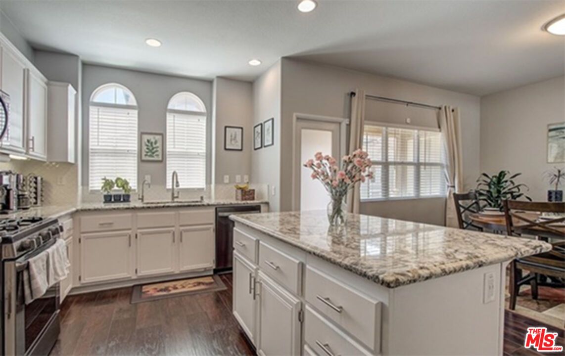 Dining room, Interior, Kitchen, Recessed Lighting, Stainless Steel Appliances, Wood Texture Flooring