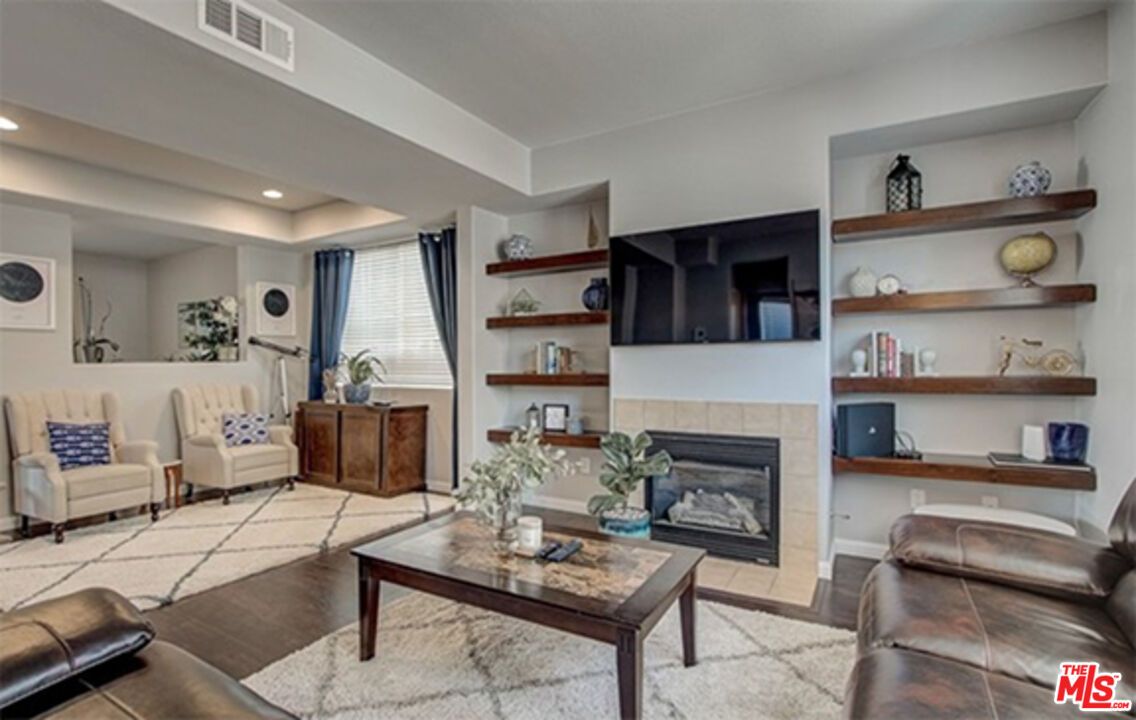 Fireplace, Interior, Living room, Recessed Lighting, Wood Texture Flooring