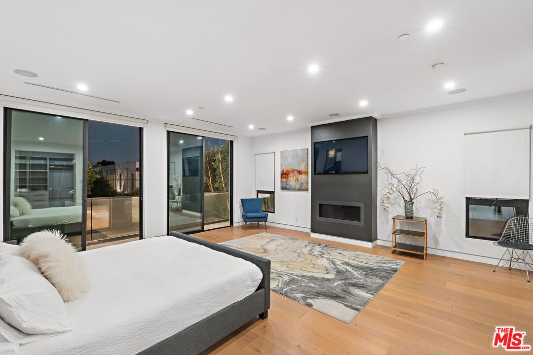 Bedroom, Fireplace, Interior, Recessed Lighting, Wood Texture Flooring