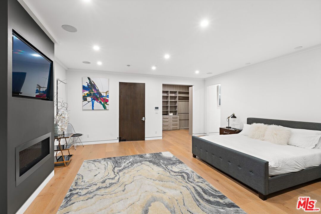 Bedroom, Fireplace, Interior, Recessed Lighting, Wood Texture Flooring