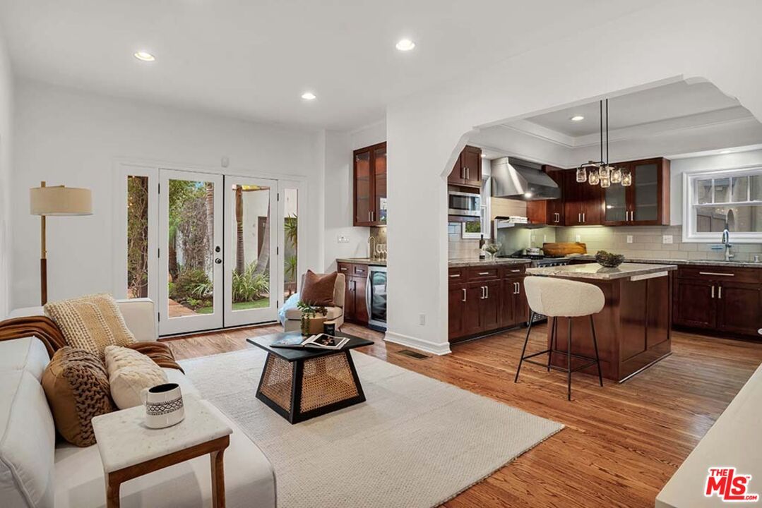 Chandelier, Interior, Kitchen, Living room, Recessed Lighting, Stainless Steel Appliances, Wood Texture Flooring