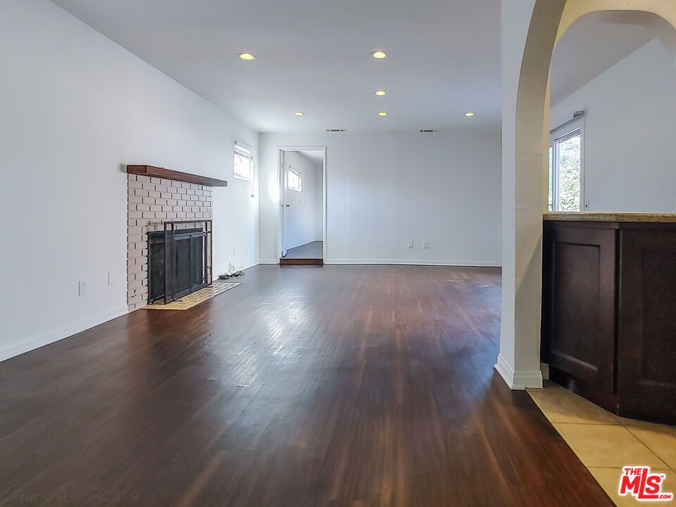 Empty room, Fireplace, Interior, Recessed Lighting, Wood Texture Flooring
