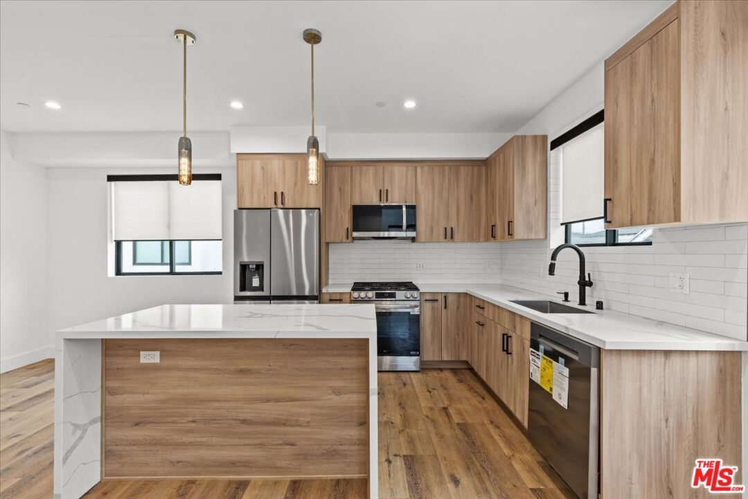 Interior, Kitchen, Pendant Lights, Recessed Lighting, Stainless Steel Appliances, Wood Texture Flooring