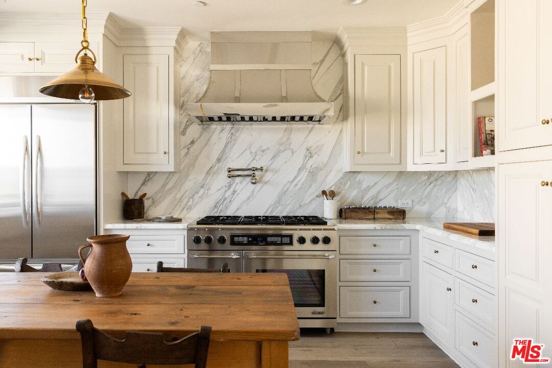 Interior, Kitchen, Marble Walls, Pendant Lights, Recessed Lighting, Stainless Steel Appliances, Wood Texture Flooring