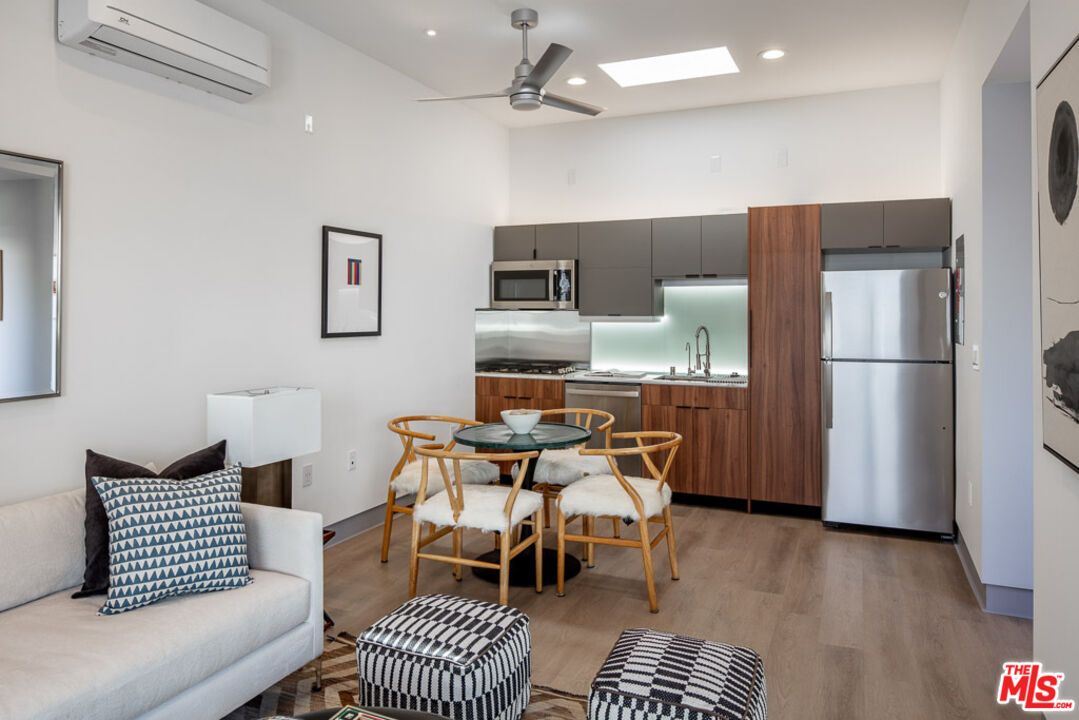 Dining room, Interior, Kitchen, Recessed Lighting, Stainless Steel Appliances, Wood Texture Flooring
