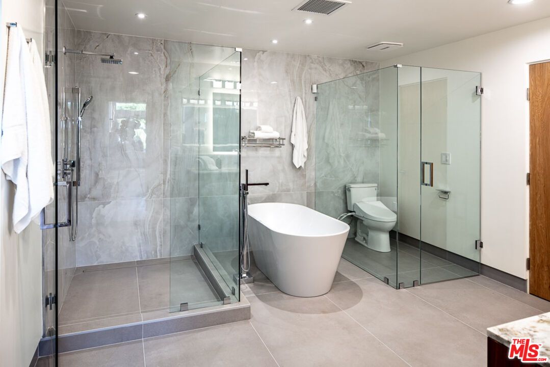 Bathroom, Free Standing Baths, Glass Shower, Interior, Marble Walls, Recessed Lighting