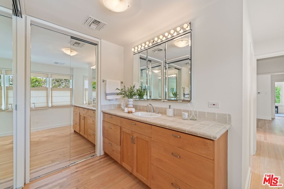 Bathroom, Dual Sink Vanities, Interior, Tile Countertops, Wood Texture Flooring