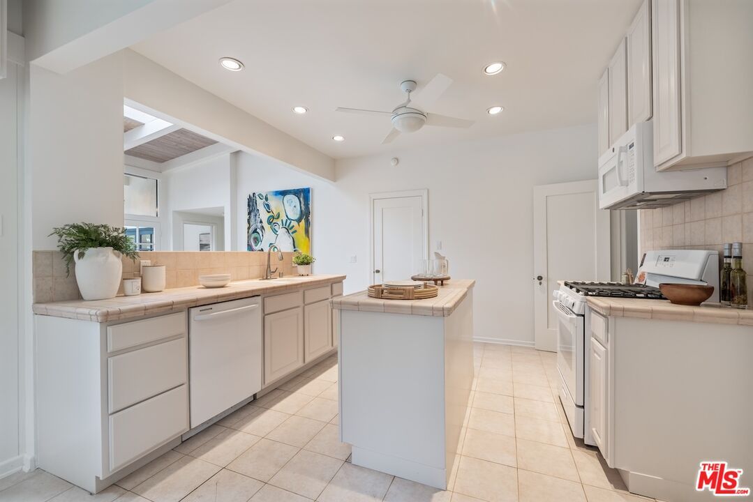 Interior, Kitchen, Recessed Lighting, Tile Countertops