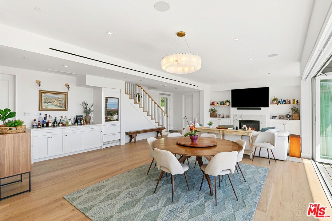 Dining room, Fireplace, Interior, Pendant Lights, Recessed Lighting, Wood Texture Flooring