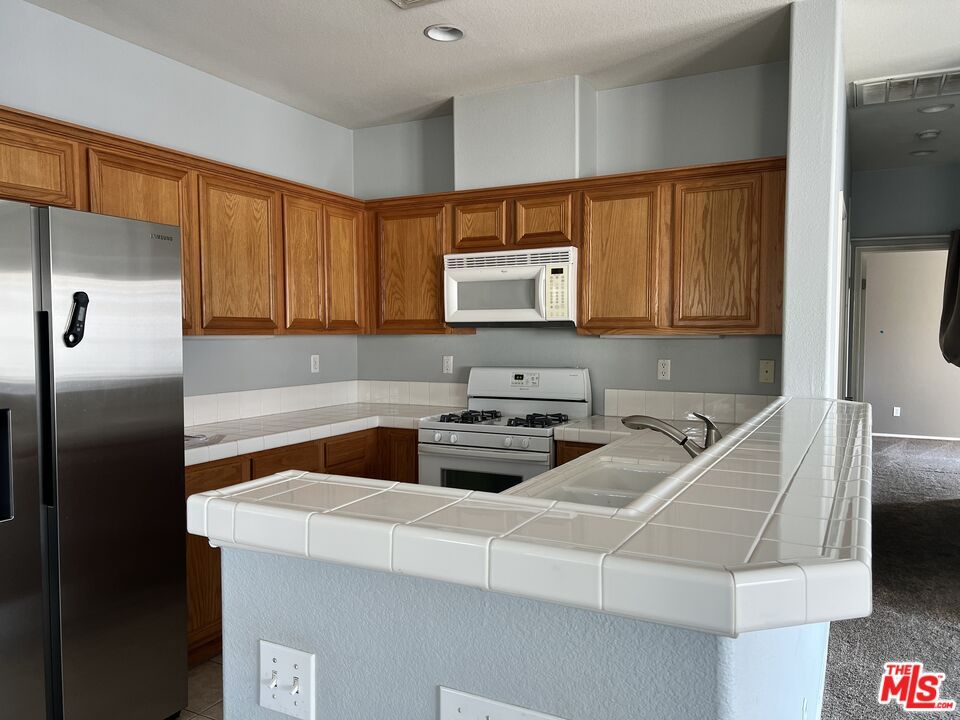 Interior, Kitchen, Recessed Lighting, Tile Countertops