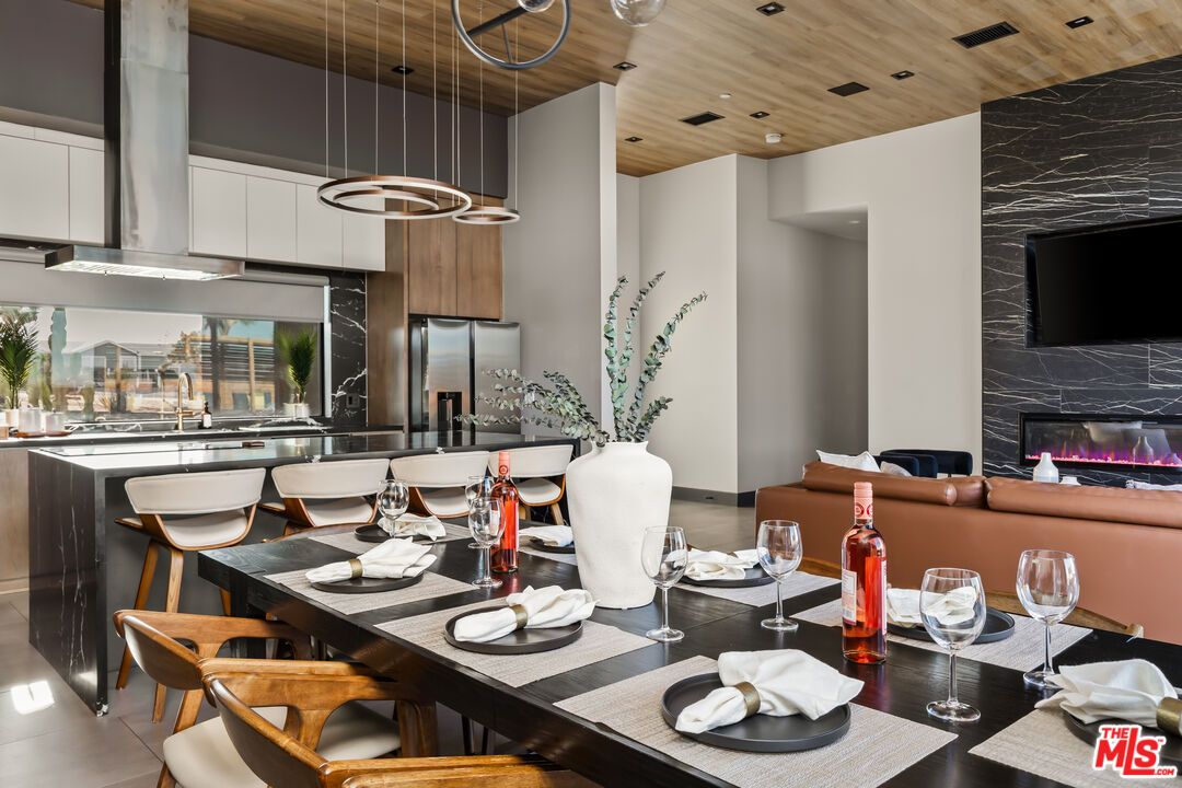 Dining room, Fireplace, Interior, Pendant Lights, Recessed Lighting, Wooden Ceilings