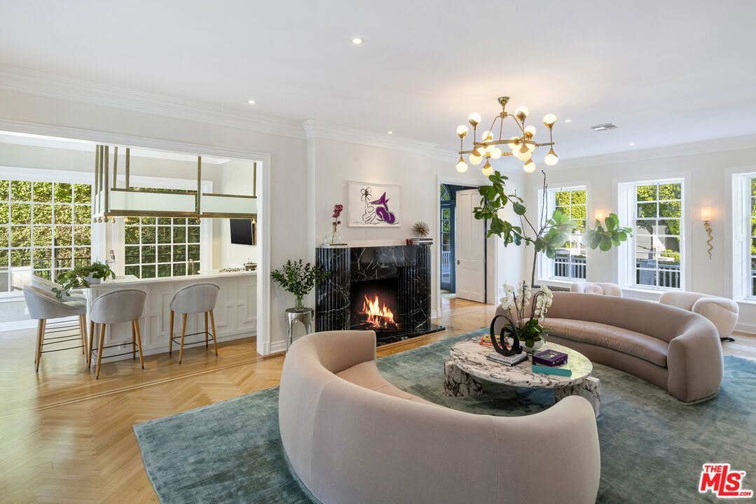 Dining room, Fireplace, Interior, Living room, Pendant Lights, Recessed Lighting, Wood Texture Flooring
