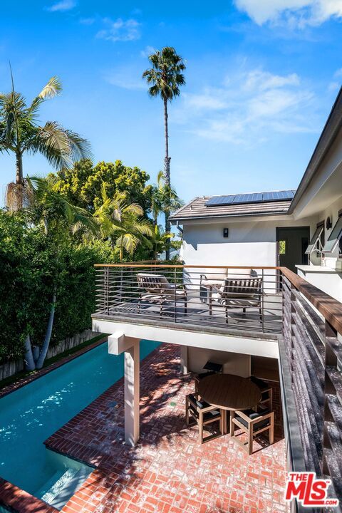 Exterior, Pool, Solar Panels