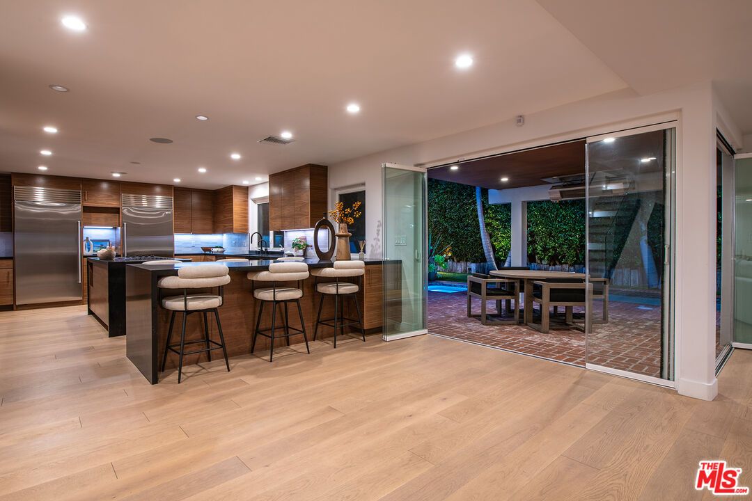 Dining room, Interior, Kitchen, Recessed Lighting, Stainless Steel Appliances, Wood Texture Flooring