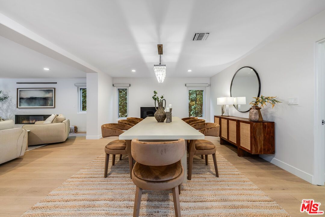 Chandelier, Dining room, Fireplace, Interior, Living room, Recessed Lighting, Wood Texture Flooring