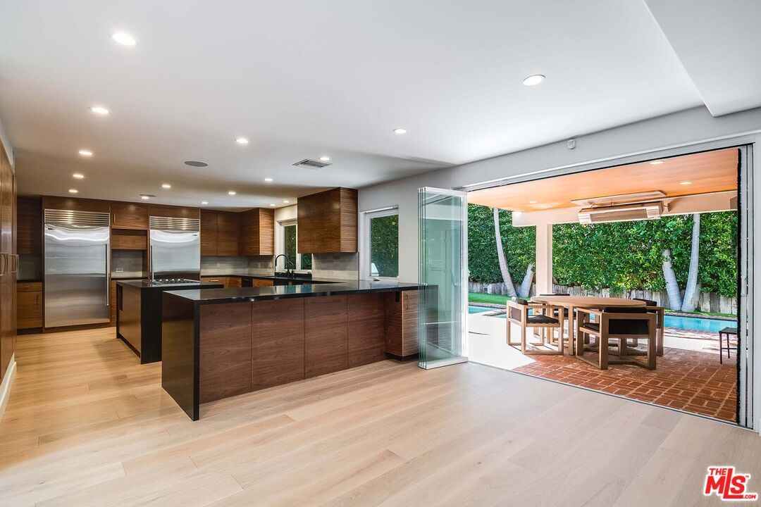 Dining room, Interior, Kitchen, Recessed Lighting, Stainless Steel Appliances, Wood Texture Flooring