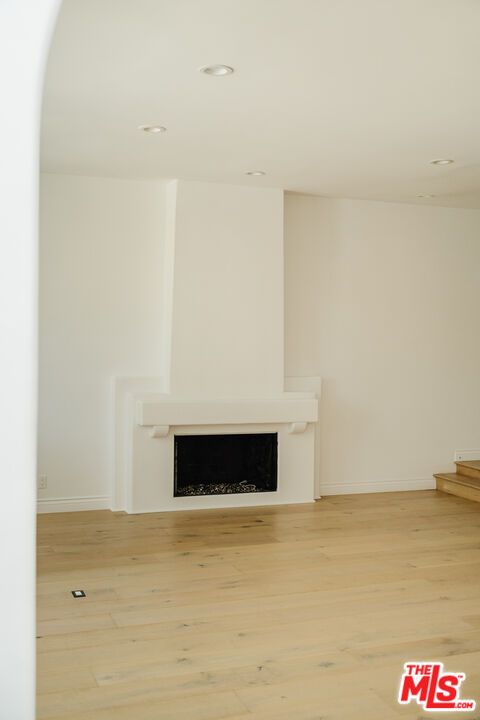 Empty room, Fireplace, Interior, Recessed Lighting, Wood Texture Flooring