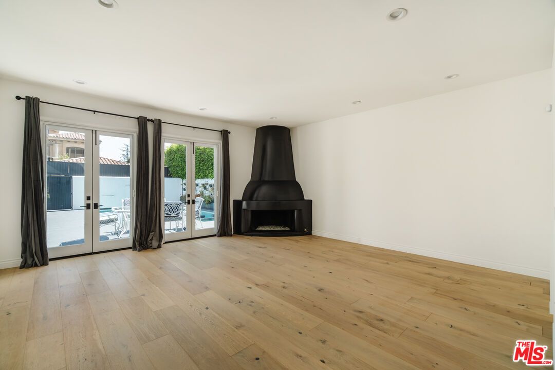 Empty room, Fireplace, Interior, Recessed Lighting, Wood Texture Flooring