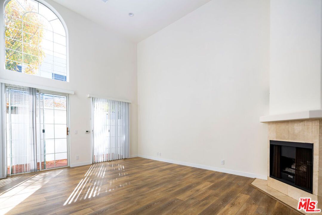 Empty room, Fireplace, Interior, Recessed Lighting, Wood Texture Flooring