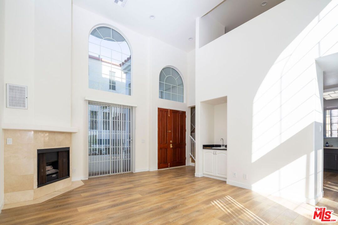 Fireplace, Interior, Recessed Lighting, Wood Texture Flooring