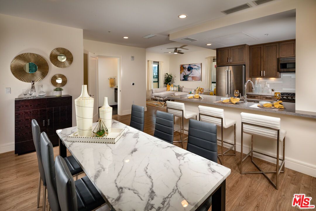 Dining room, Interior, Kitchen, Recessed Lighting, Stainless Steel Appliances, Wood Texture Flooring