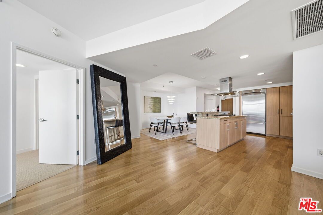 Dining room, Interior, Kitchen, Recessed Lighting, Stainless Steel Appliances, Wood Texture Flooring